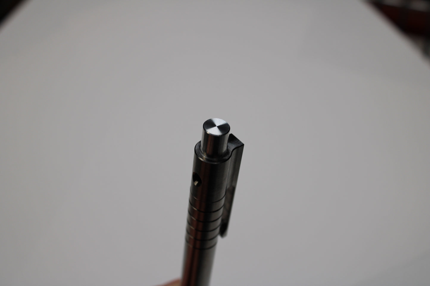 40 Click Clipped Pen - 6Al-4V Titanium - 6061 Aluminum Button - Conical Nose - ISO G2 (Parker)